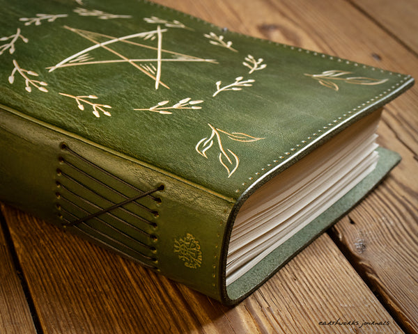 green leather journal with folk pentagram 2 - earthworks journals