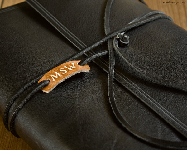 personalised leather tag - earthworks journals