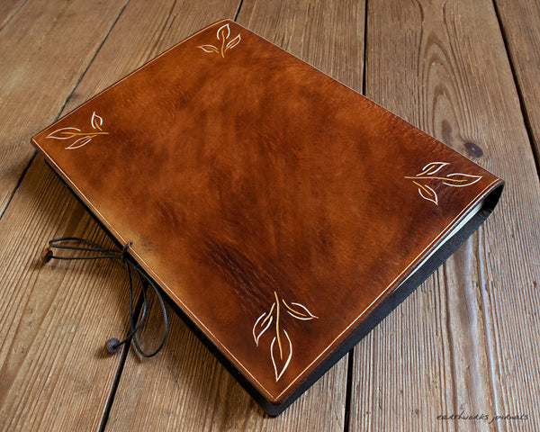 A4 brown leather journal with folk pentagram and leaves 4 - earthworks journals