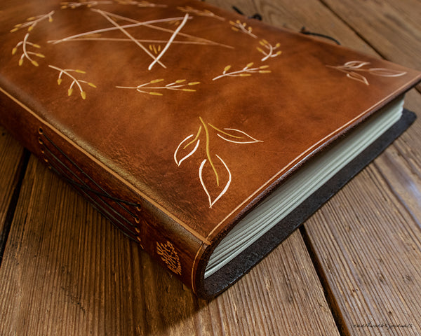 A4 brown leather journal with folk pentagram and leaves 2 - earthworks journals