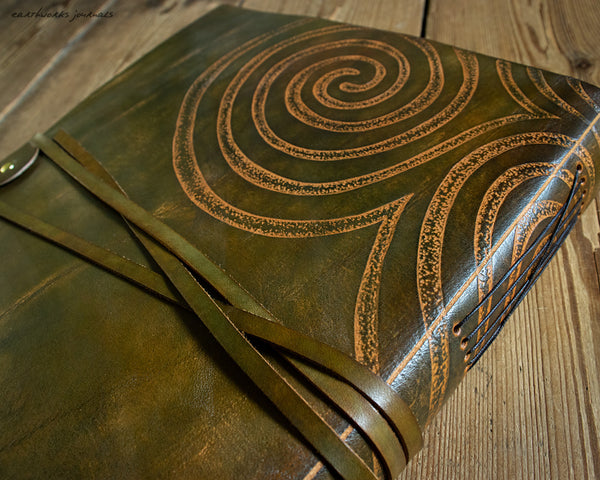 A4 brown and green leather journal with Neolithic triple spiral design 4 - earthworks journals
