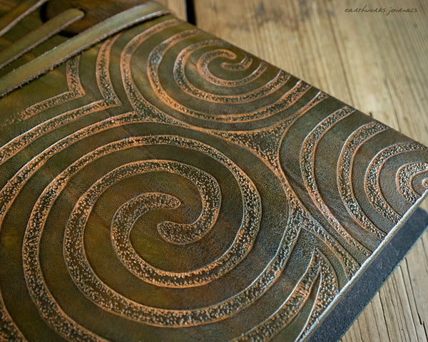 A4 brown and green leather journal with Neolithic triple spiral design 5 - earthworks journals