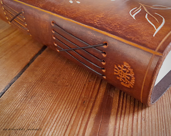 A5 brown leather journal with pentagram and leaves 3 - earthworks journals