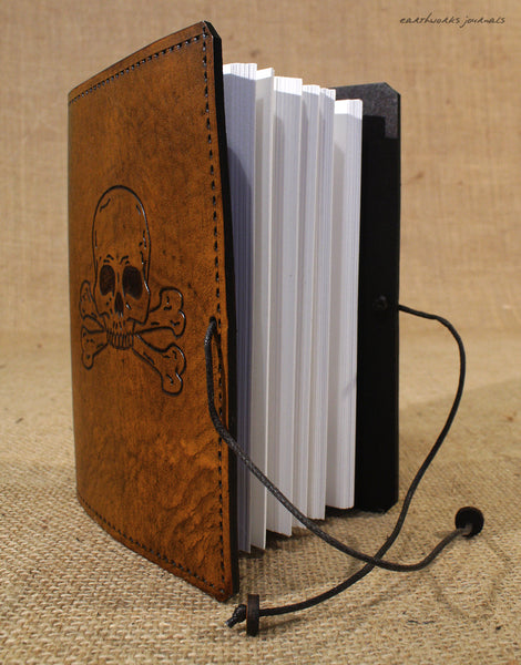 A6 brown leather journal - skull and cross bones open - earthworks journals - A6C022