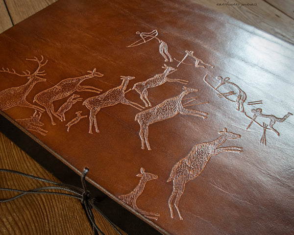 A4 LASCAUX CAVE PAINTING STAGS - BROWN LEATHER JOURNAL 5 - EARTHWORKS JOURNALS