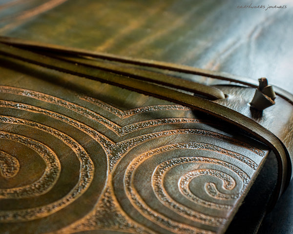A4 brown and green leather journal with Neolithic triple spiral design 6 - earthworks journals