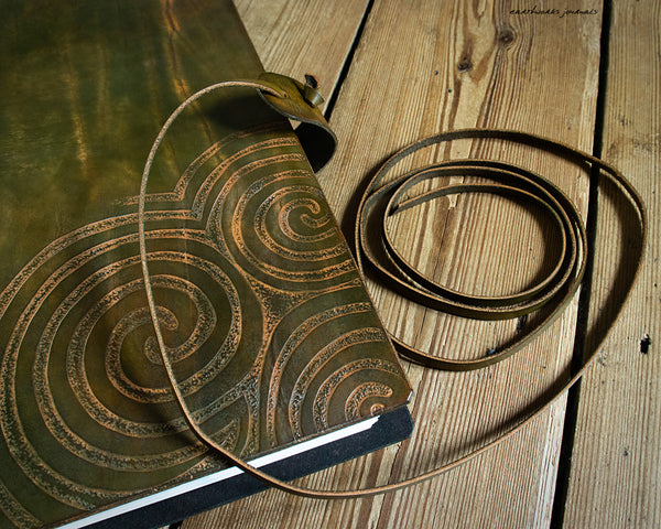 A4 brown and green leather journal with Neolithic triple spiral design 7 - earthworks journals