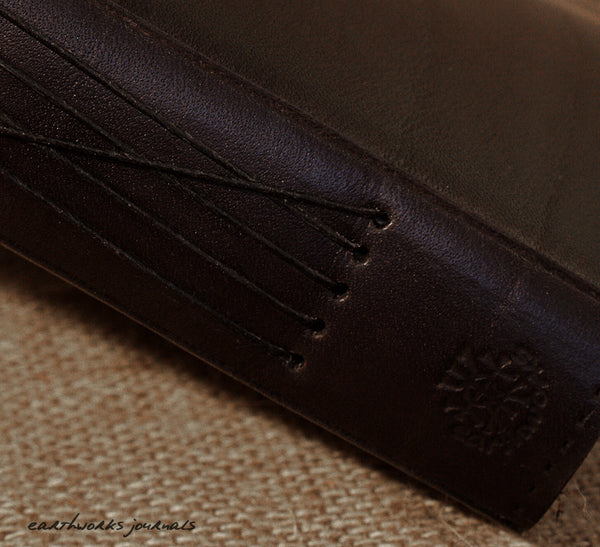 A4 black leather journal - spine detail - earthworks journals