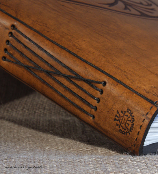 A4 brown leather journal - spine detail - earthworks journals