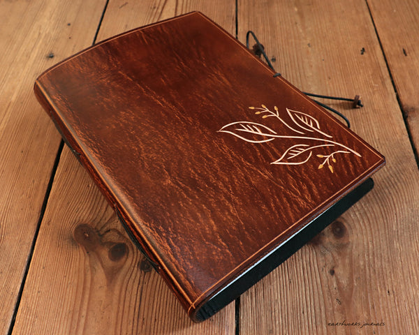 A5 brown leather journal with hedgerow leaves design 1 - earthworks journals