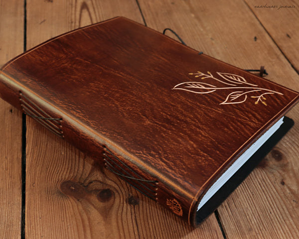 A5 brown leather journal with hedgerow leaves design 2 - earthworks journals