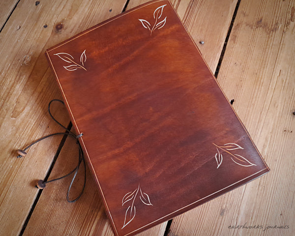 A5 brown leather journal with pentagram and leaves 4 - earthworks journals