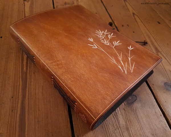 A5 brown leather journal with wild grass design 1 - earthworks journals