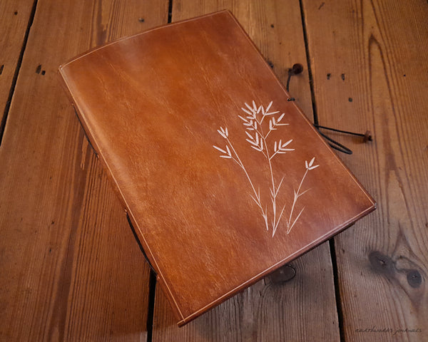 A5 brown leather journal with wild grass design 3 - earthworks journals