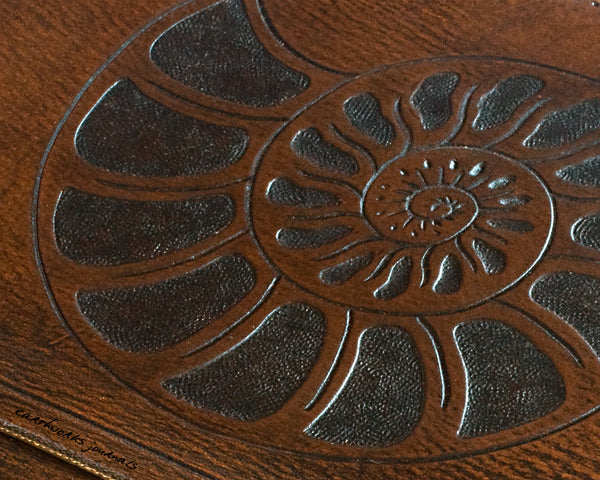 A5 brown leather journal - ammonite seashell design detail - earthworks journals - A5C002