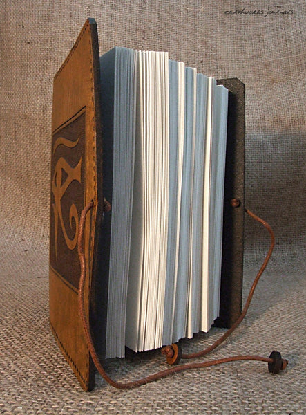 A6 brown leather journal - egyptian eye of horus open - earthworks journals - A6C003