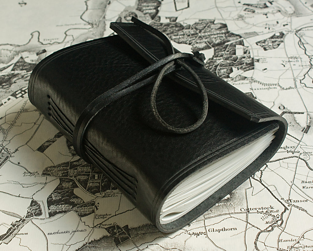 A6 rugged black leather journal 4 - wraparound - earthworks journals - A6W008