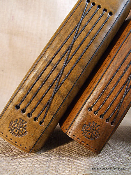 a6 brown leather journal - spines - earthworks journals