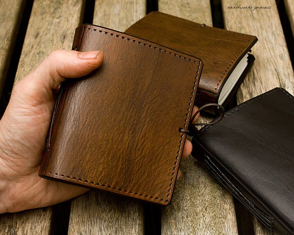 A7 plain classic leather pocket notebook - group - earthworks journals