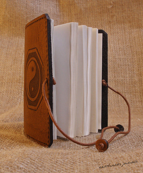 A7 brown leather journal - tai chi - yin yang open - earthworks journals - A7C005